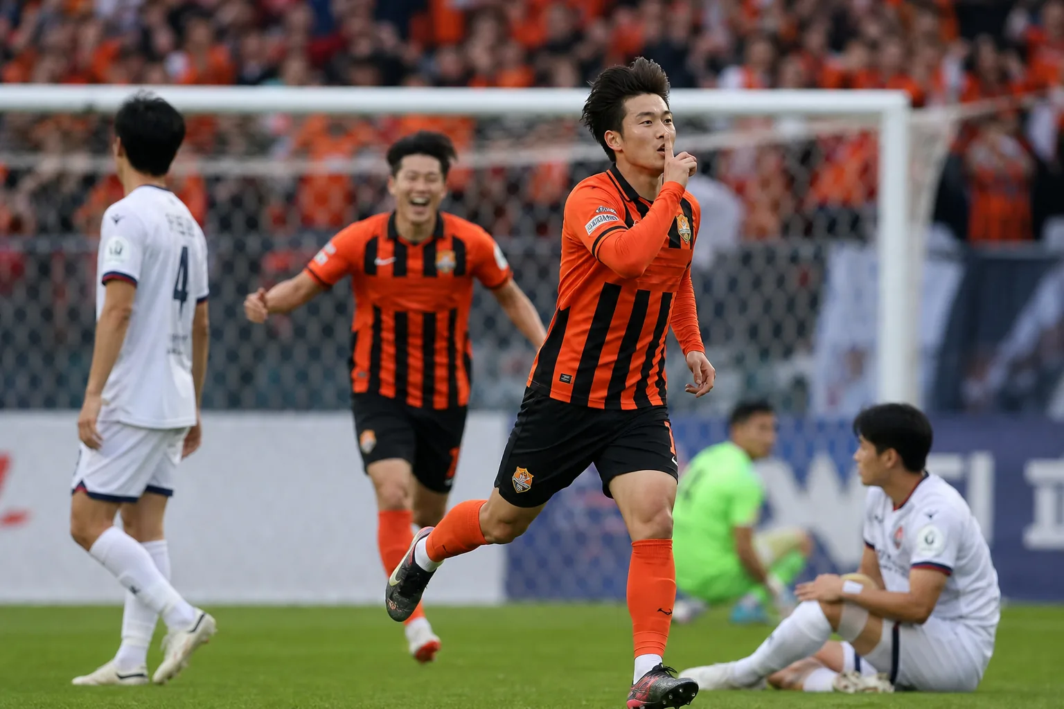 프리킥으로 선제골을 노리는 축구 경기 장면